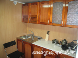 Кухня облагороженная пластиком серого цвета