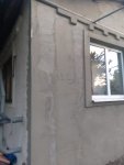 Шпаклёвка внешних откосов на фасаде частного дома