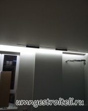 Освещение трекинговыми светильниками стен